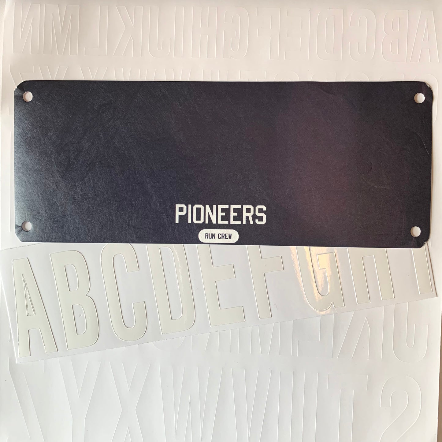 Pioneers Run Crew Collaboration Yell my name race bib topper kit!
